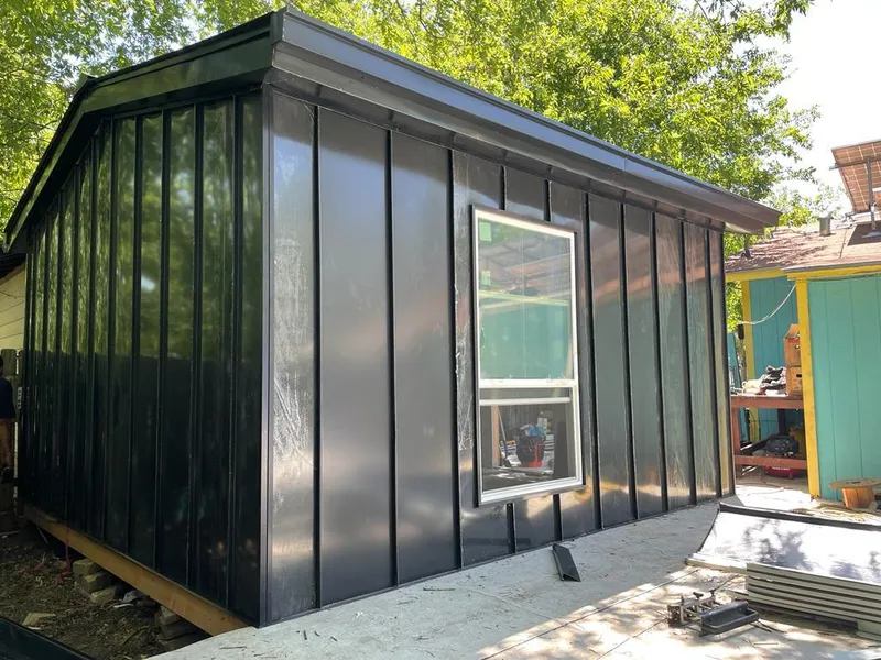 Black standing seam metal wall panels for Roof Inspection in Midway